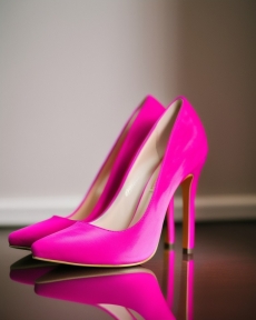 an image of a bright pink pair heels